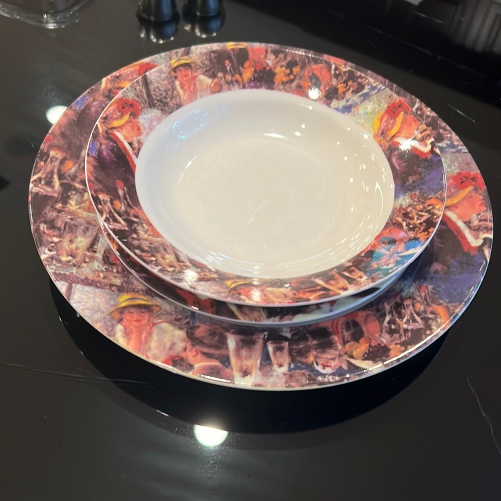 Three piece dinner set with beautiful Renoir artwork printed on.
